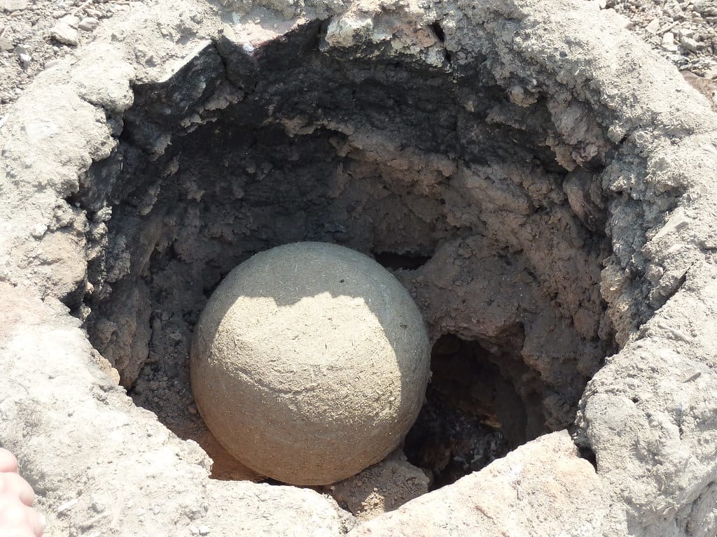 A view down into a small kiln's firing chamber